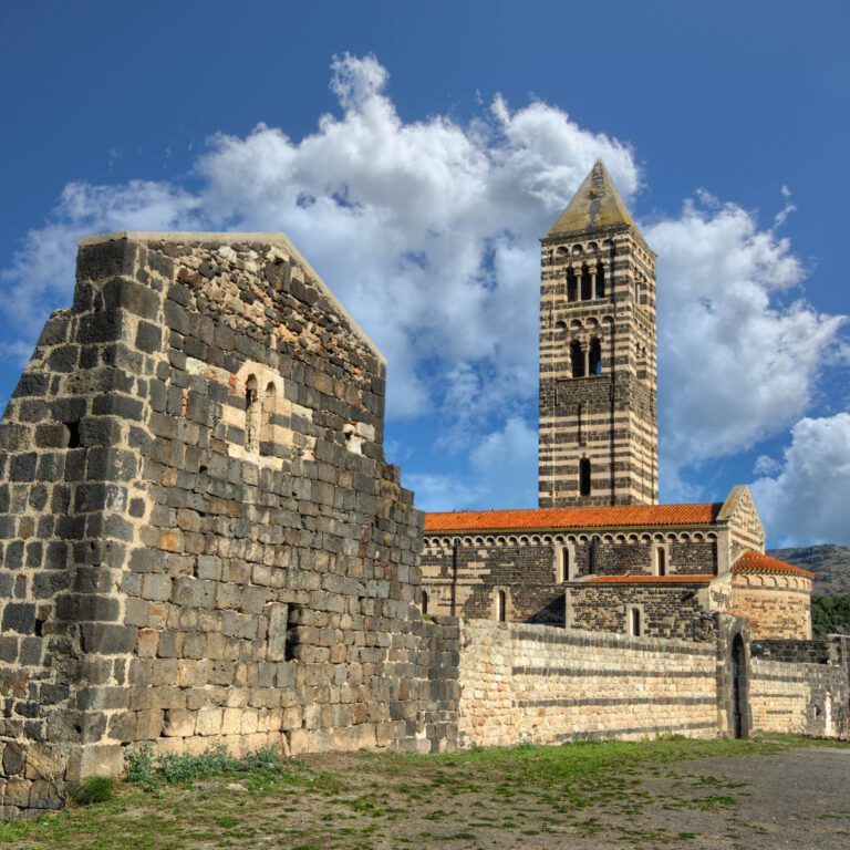 Basilica della Santissima Trinità di Saccargia vista dalle rovine del monastero